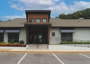 Thumbnail 20 of 39 - Exterior of the clubhouse at Woods of Fairfax.