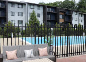 Thumbnail 33 of 39 - Deck View of Pool at Woods of Fairfax