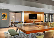Thumbnail 19 of 37 - Game room with ping pong table and lounge seating at The Lyric Apartments, Seattle