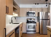 Thumbnail 10 of 37 - Residential Kitchen at The Lyric Apartments, Seattle, WA