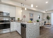 Thumbnail 9 of 18 - Kitchen Living Room at Liberty Square Apartments - Saltlake City, UT Apartments, Saltlake City, Utah