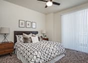 Thumbnail 12 of 18 - Bedroom with ceiling fan at Liberty Square Apartments - Saltlake City, UT Apartments, Saltlake City, UT, 84102