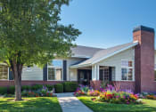 Thumbnail 8 of 17 - Bridgeside Landing Apartments,  Taylorsville, Utah, Front of main office which holds the leasing office, clubroom, laundry room and fitness center.