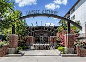 Thumbnail 1 of 34 - Property entrance with arched metal signage at Liberty Gateway Apartments, Utah, 84101