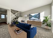 Thumbnail 3 of 26 - Contemporary living space with staircase and blue seating at Liberty Hill Apartments, Draper, Utah