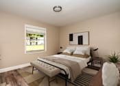 Thumbnail 15 of 29 - a bedroom with a large bed and a window