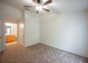 Thumbnail 9 of 14 - Large bedroom with ensuite and ceiling fan