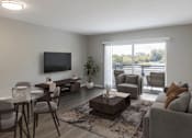 Thumbnail 1 of 15 - A modern living room with a glass table and grey chairs.