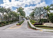 Thumbnail 27 of 29 - A street view of a residential area with the name "SEASCAPE" on a sign.