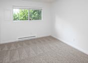 Thumbnail 7 of 16 - a small empty room with a window