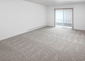 Thumbnail 3 of 16 - a bedroom with a large window and a carpeted floor