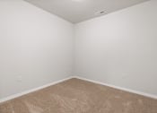 Thumbnail 9 of 24 - a spacious bedroom with plush carpeting