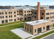 Thumbnail 25 of 25 - an aerial view of historic Brooke Street Lofts in Fond du Lac, WI