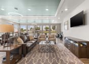 Thumbnail 15 of 24 - River Flats TV viewing area in the large clubhouse