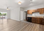 Thumbnail 1 of 24 - a spacious, open kitchen and living area in a River Flats Apartment