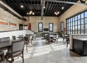 Thumbnail 18 of 25 - the large community room with ample seating at Brooke Street Lofts in Fond du Lac, WI