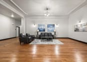 Thumbnail 20 of 25 - a lounge with arm chairs, a sofa, and coffee table at Brooke Street Lofts