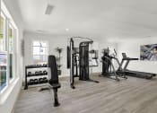 Thumbnail 13 of 18 - Rock Creek's state of the art fitness center with cardio and strength equipment