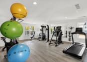 Thumbnail 14 of 18 - The newly renovated fitness center with strength, stretching, and cardio equipment at Rock Creek Apartments in Cordova, TN