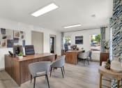 Thumbnail 11 of 18 - The Rock Creek Apartments leasing office with two leasing desks