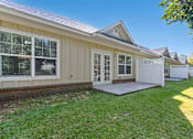 Thumbnail 16 of 28 - open concept living room patio home Fairhope AL