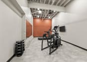 Thumbnail 21 of 25 - a fitness center with cardio and strength equipment