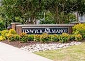Thumbnail 1 of 56 - brick monement sign with Fenwyck Manor name and logo in front of community entrance