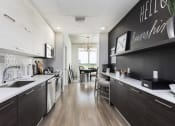 Thumbnail 20 of 42 - modern kitchen with stainless steel at Lake Nona Pixon, Florida, 32827