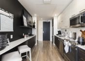 Thumbnail 21 of 42 - ultra modern kitchen with Italian cabinetry at Lake Nona Pixon, Orlando, FL, 32827
