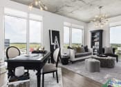 Thumbnail 24 of 42 - modern living room with hardwood style floors at Lake Nona Pixon, Orlando, 32827