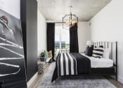 Thumbnail 30 of 42 - bedroom with large windows and modern chandelier at Lake Nona Pixon, Orlando, FL, 32827