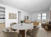 Thumbnail 2 of 36 - a living room and dining room with a table and chairs