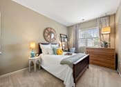 Thumbnail 30 of 56 - spacious bedroom with model decor and large window in Fenwyck Manor Apartment home