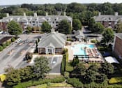 Thumbnail 54 of 56 - an aerial view of the pool and clubhouse at Centerville Manor Apartments in Virginia Beach