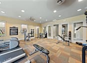 Thumbnail 39 of 56 - Clubhouse Fitness Center with cardio, strength, and free weights at Fenwyck Manor