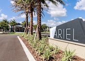 Thumbnail 3 of 30 - Ariel entrance sign with beautiful palm trees