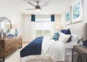 Thumbnail 17 of 42 - Spacious furnished bedroom with ceiling fan  at LandonHouse Apartments in Lake Nona, Orlando, FL 32827