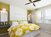 Thumbnail 17 of 30 - model bedroom with designer fan and large windows