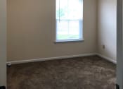 Thumbnail 9 of 18 - spacious bedroom with plush carpeting