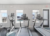 Thumbnail 9 of 48 - brand new cardio equipment in the fitness studio at Sanctuary at Indian Creek rental homes in Madison Huntsville, AL