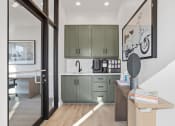 Thumbnail 10 of 48 - a small kitchenette with a sink and deluxe Coffee Café in the clubhouse at Sanctuary at Indian Creek