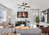Thumbnail 43 of 48 - a nicely decorated living room with large windows and natural light in a rental home at Sanctuary at Indian Creek
