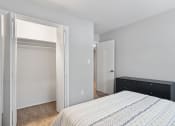 Thumbnail 8 of 14 - a large closet with a hanging bar and shelf in a bedroom at Mountainside Apartments