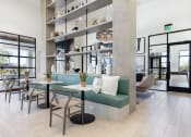 Thumbnail 3 of 48 - tables, chairs, and bench seating in clubhouse at Lake Nona Concorde