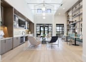 Thumbnail 2 of 48 - spacious clubhouse lounge and kitchenette cafe area at Lake Nona Concorde