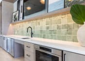 Thumbnail 7 of 48 - the kitchenette in the clubhouse at Lake Nona Concorde