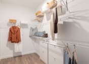 Thumbnail 42 of 48 - walk-in closet with built-in shelving in Concorde apartment