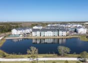 Thumbnail 48 of 48 - The large beautiful pond beside the apartment buildings at Lake Nona Concorde