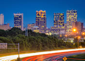 Thumbnail 34 of 37 - car lights along the interstate outside of birmingham, alabama at night