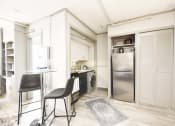 Thumbnail 1 of 24 - entrance into kitchen with stainless steel appliances and wood-style flooring
